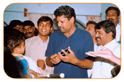 Mr. N Bitra, Friends & Family, With Mr. Kapil Dev & Sri PNV Prasad, Ex. SAAP Chairman, The occasion of Kinetic Boss Vehicle Opening at Bitra's House At Banjara Hills, Road No. 10, On 21st Oct'2002.